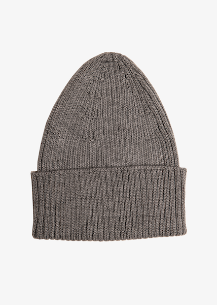 A gray Brooklyn Beanie made of merino wool with a ribbed texture.